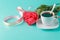 Valentine\'s Day: red roses, coffee cup and ribbons