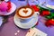 Valentine's day romantic breakfas with cappuccino or coffeet.Romantic background