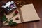 Valentine\'s Day - Rose, chocolates and camera on notebook