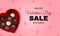 Valentine`s day sale pink website banner. Realistic heart shaped present box filled with truffles chocolate.