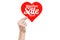 Valentine\'s Day and sale topic: Hand holding a card in the form of a red heart with the word Sale isolated on white background