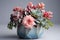 Valentine's day succulent arrangement in a geometric pot with blush and serenity blue tones