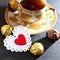 Valentine`s Day, a symbol of love. Still life - tea in a golden