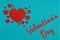 Valentine`s day text with hearts on turquoise leather