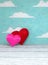 Valentine`s Day two hearts on painted sky background