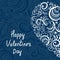 Valentine\\\'s Day. Vintage openwork heart. Gentle heart half on a dark blue background