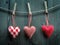 Valentine\'s Day wallpaper - Textile hearts hanging on the rope
