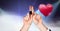 Valentine`s fingers love couple and Shiny heart glowing with purple misty lights flares background