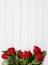 Valentine\'s: Red Roses on White Wood Background