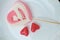 Valentine Sweet candy dessert : Meringues and Thai Deletable imitation fruits or Ball plated dessert design in heart shape on whit