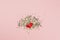 Valentines abstract Top view of golden stars confetti red heart in two pieces with copy space millennial pink color paper