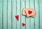 Valentines background with gift box and hearts on on shabby chic