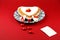 Valentines cake on the red background