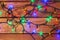Valentines or christmas romantic lights on wood background