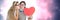 Valentines couple holding heart and love hearts background