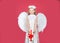 Valentines Day. Angel child from heaven gives you gift. Little angel Girl in white dress with angel wings on isolated