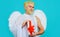 Valentines day Angel with gift box. Cupid with present. Bearded man with white wings.