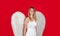 Valentines Day. Angel girl with white wings. Angelic beautiful woman. Cute female cupid. Love.