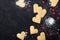 Valentines day background with cookies in shape of heart. Sweet baking. Top view.