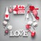 Valentines day background . Festive composition of love made with gift box and red bow, bottle of champagne with glasses, hearts