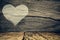 Valentines day background with heart on grunge wood background.