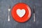 Valentines day background with heart shape plate. Restaurant dinner or menu concept.