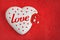 Valentines day background - heart shaped cookie on red