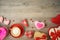 Valentines day background with heart shapes, coffee cup and  gift boxes. Top view from above