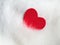 Valentines day background with red heart on white cat hair. Valentines day card. Love and Valentine concept