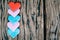 Valentines day background with red hearts over grunge wooden tab