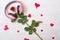 Valentines Day background with a red rose and headphones.Romantic music about love.