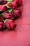 Valentines Day background with red roses close up - vertical