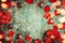 Valentines day background with red roses , petals , glass heart and bokeh lighting, top view