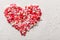 Valentines Day candy heart made of red, white, pink sprinkles