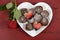 Valentines Day chocolate dipped heart shaped strawberries with chocolate roulade swiss roll