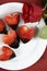 Valentines Day chocolate dipped heart shaped strawberries closeup