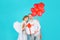Valentines day Couple with white wings. Cupid angel woman with balloons and bearded man with gift.