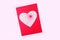 Valentines day craft. How to make valentine greeting card with cut heart from paper, marker and ruler. DIY and kid`s creativity