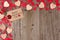 Valentines Day gift tag with heart corner border on wood