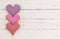 Valentines Day greeting card with romantic love hearts border on white wood with copy space