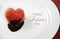 Valentines Day heart shape red strawberry dipped in dark chocolate