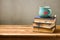 Valentines day holiday concept with tea cup and books on wooden table