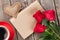 Valentines day letter, coffee cup and red roses