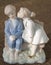 Valentines day porcelain statuette of kissing boy