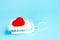 Valentines day red heart lies white sleigh blue background