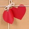 Valentines day red heart shape gift tag, brown paper package parcel background