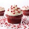 Valentines day, red velvet cupcake with hearts decoration on cream cheese frosting closeup