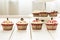 Valentines Day Red Velvet Cupcakes with Sprinkles on Light White Wooden Background, Horizontal View