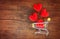 Valentines day shopping and red heart on shopping cart love concept / Shopping holiday for love