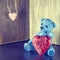 Valentines Day. Teddy Bear Loving cute with red hearts sitting alone. Vintage